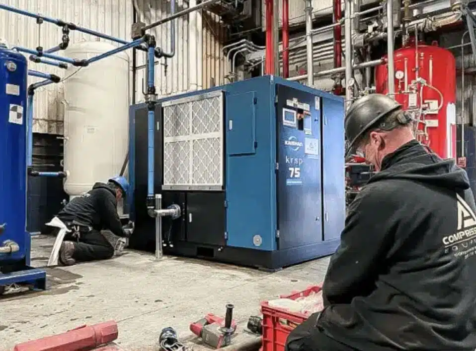 Canex Technologies technicians performing expert Kaishan air compressor installation and piping connections for Ontario manufacturing operations.